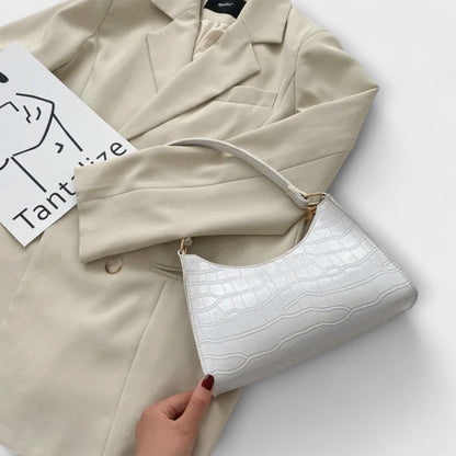 תיק עור מבריק הלורה - סגנון ופונקציונליות מושלמת