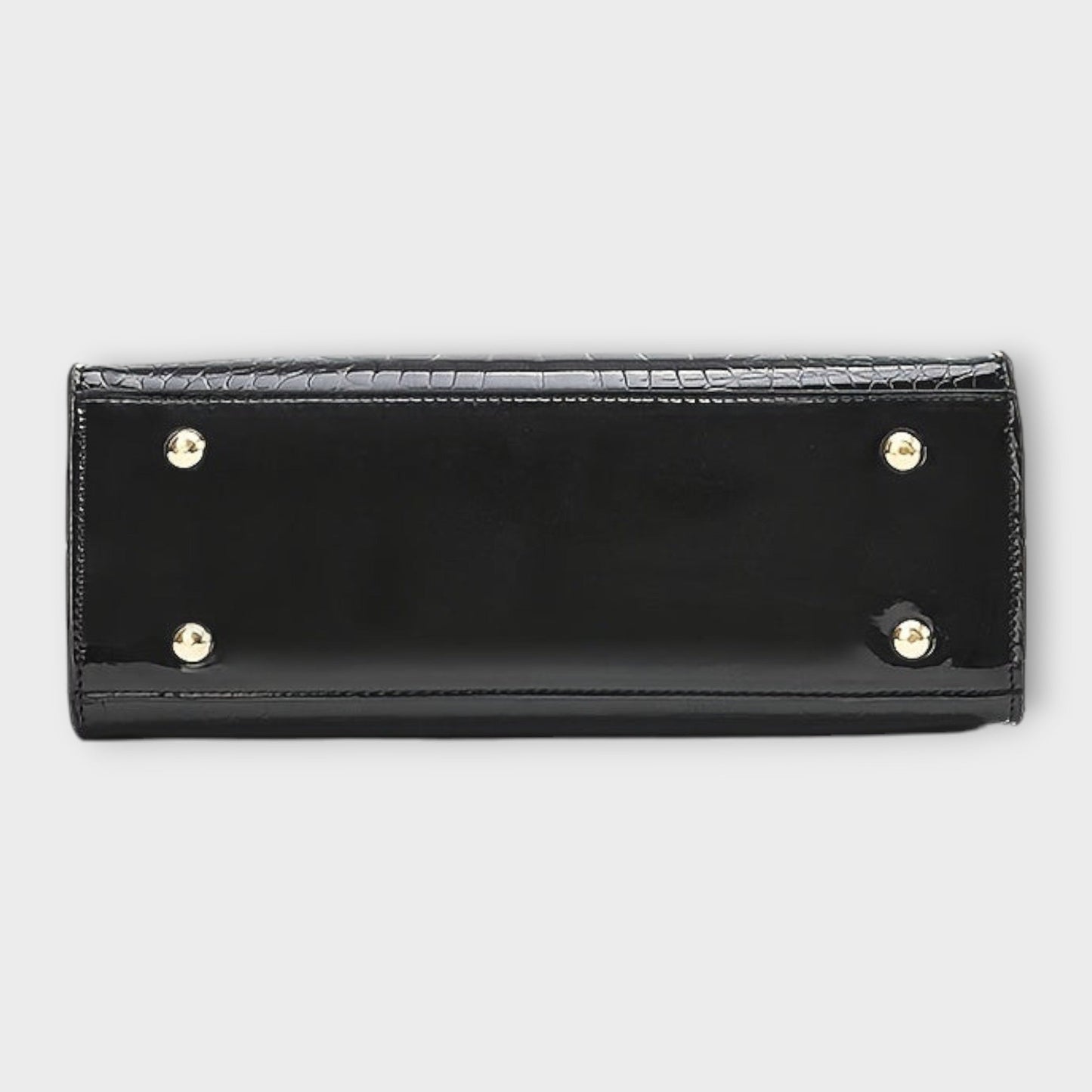 תיק יד מבריק בדוגמת עור תנין של לורה